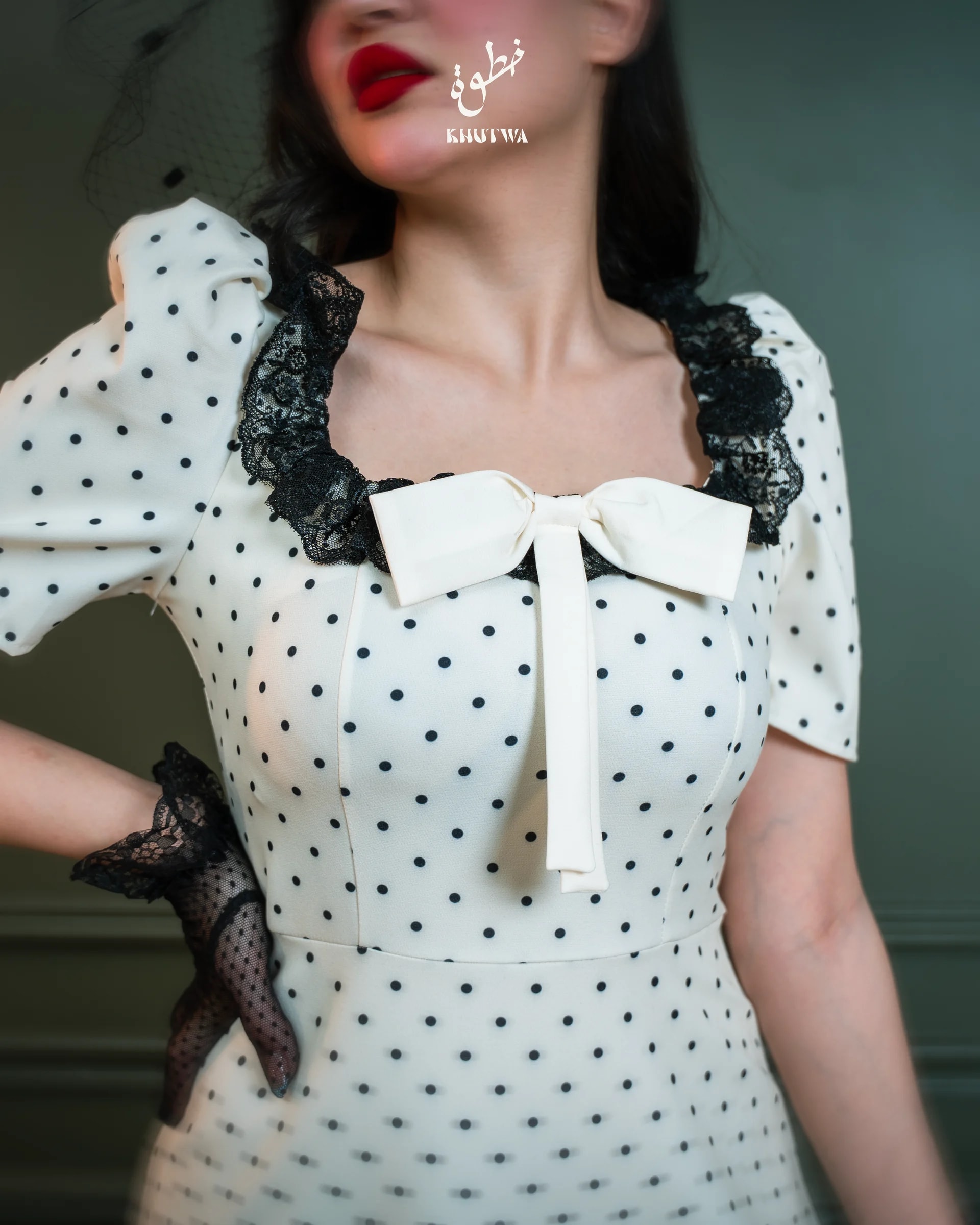 Sahar bow and lace detail